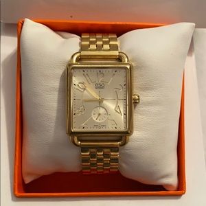 Movado - NEW in BOX never worn woman’s gold watch.